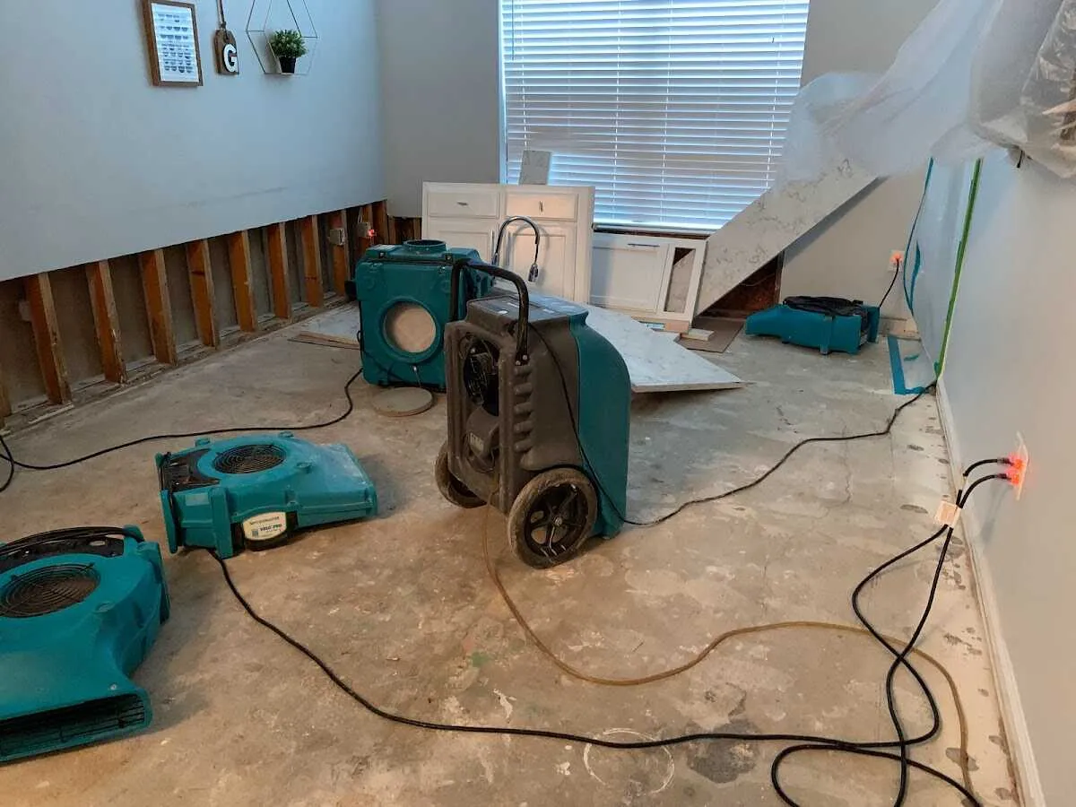 Dehumidifier in flood-cut room for Water Damage Restoration in Stallings